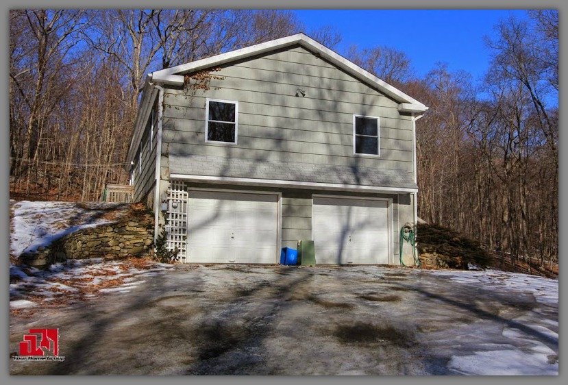 This Kent CT home for sale is the weekend retreat you have been dreaming of owning!