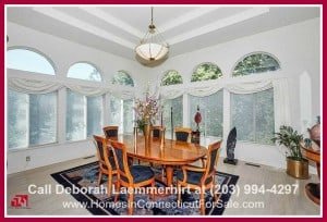 Dine in style in the formal dining room of this strikingly attractive 4 bedroom home for sale in New Milford CT.