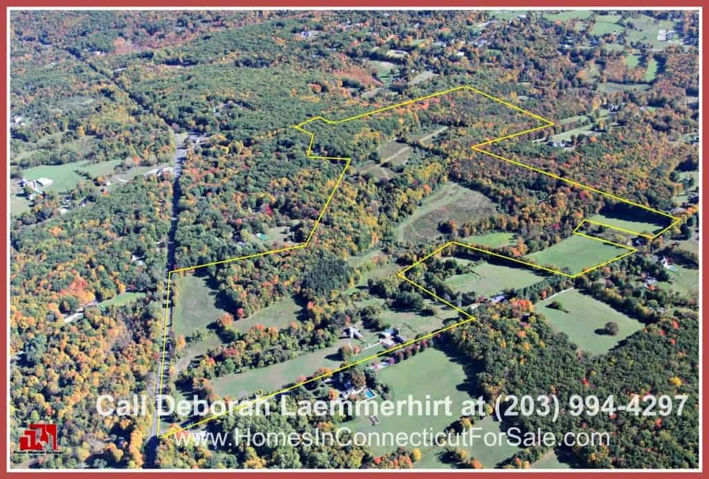 Live conveniently in this CT luxury equestrian property where you can be minutes away from major routes.