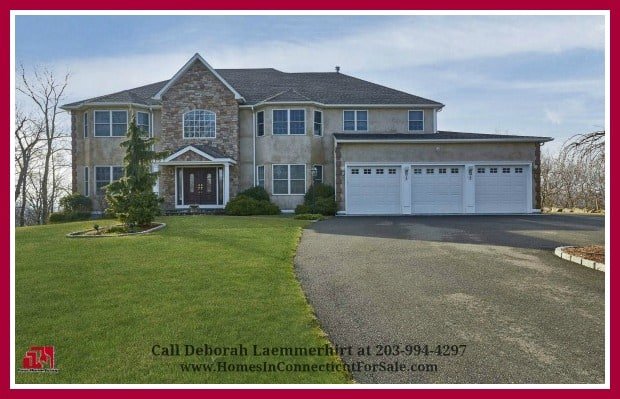 This gorgeous New Fairfield CT luxury home for sale in Red Fox Crossing exudes superiority throughout with its beautifully manicured landscape and spectacular exteriors and interiors.